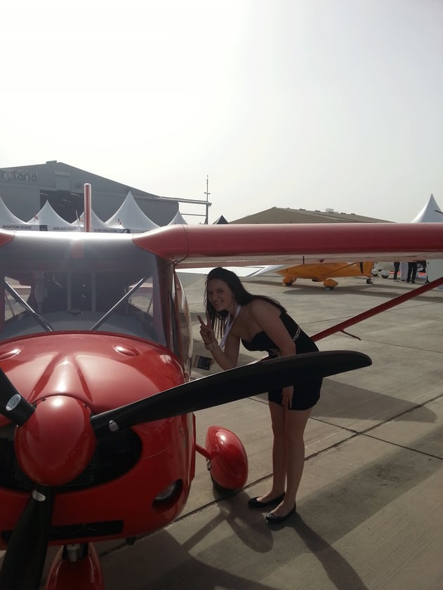 Women-in-aviation-fta-paulina-red-aircraft.gif